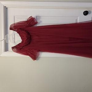 Burgundy off the shoulder sheer back dress.